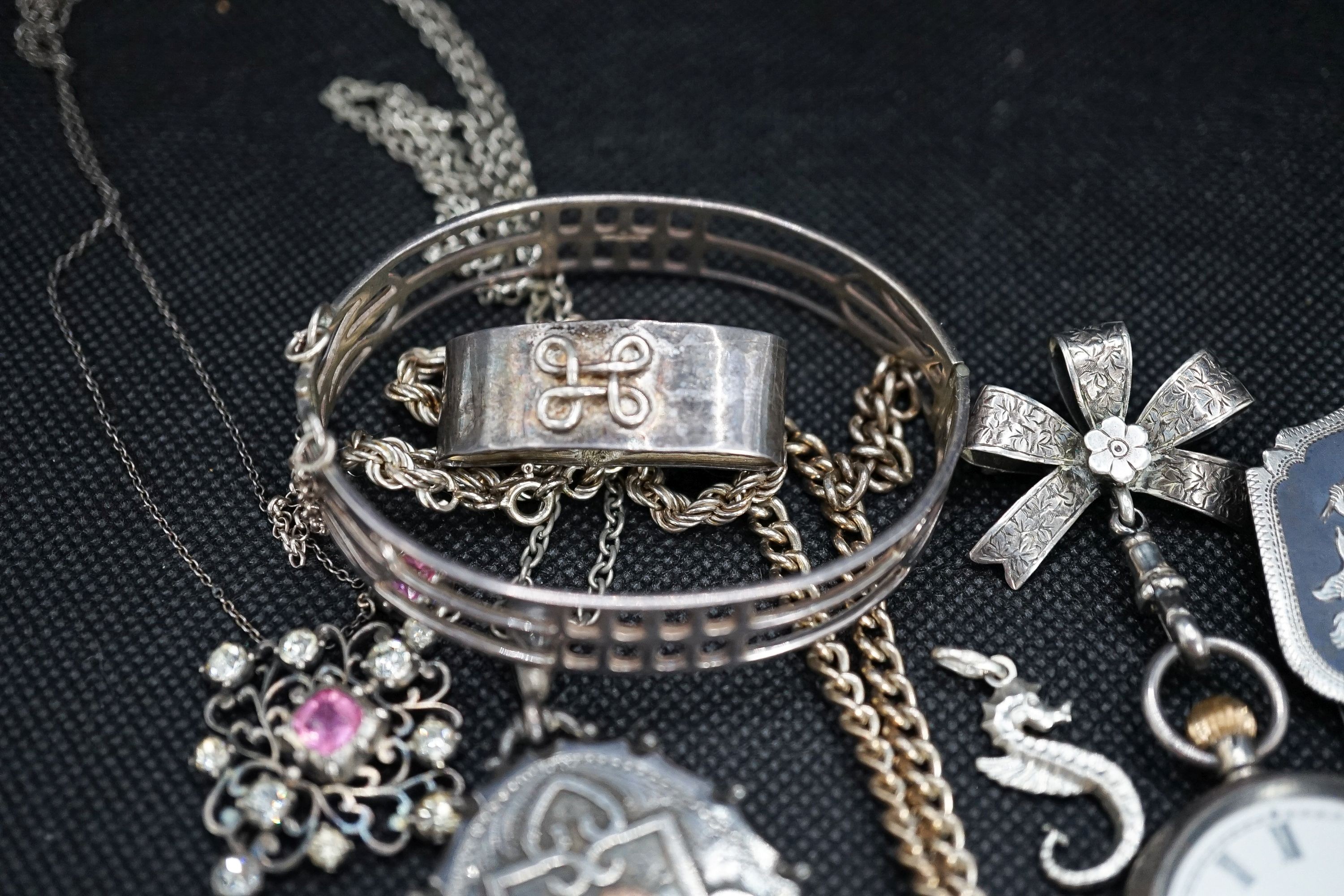 A silver fob watch, a late Victorian silver oval locket and other items of minor jewellery.